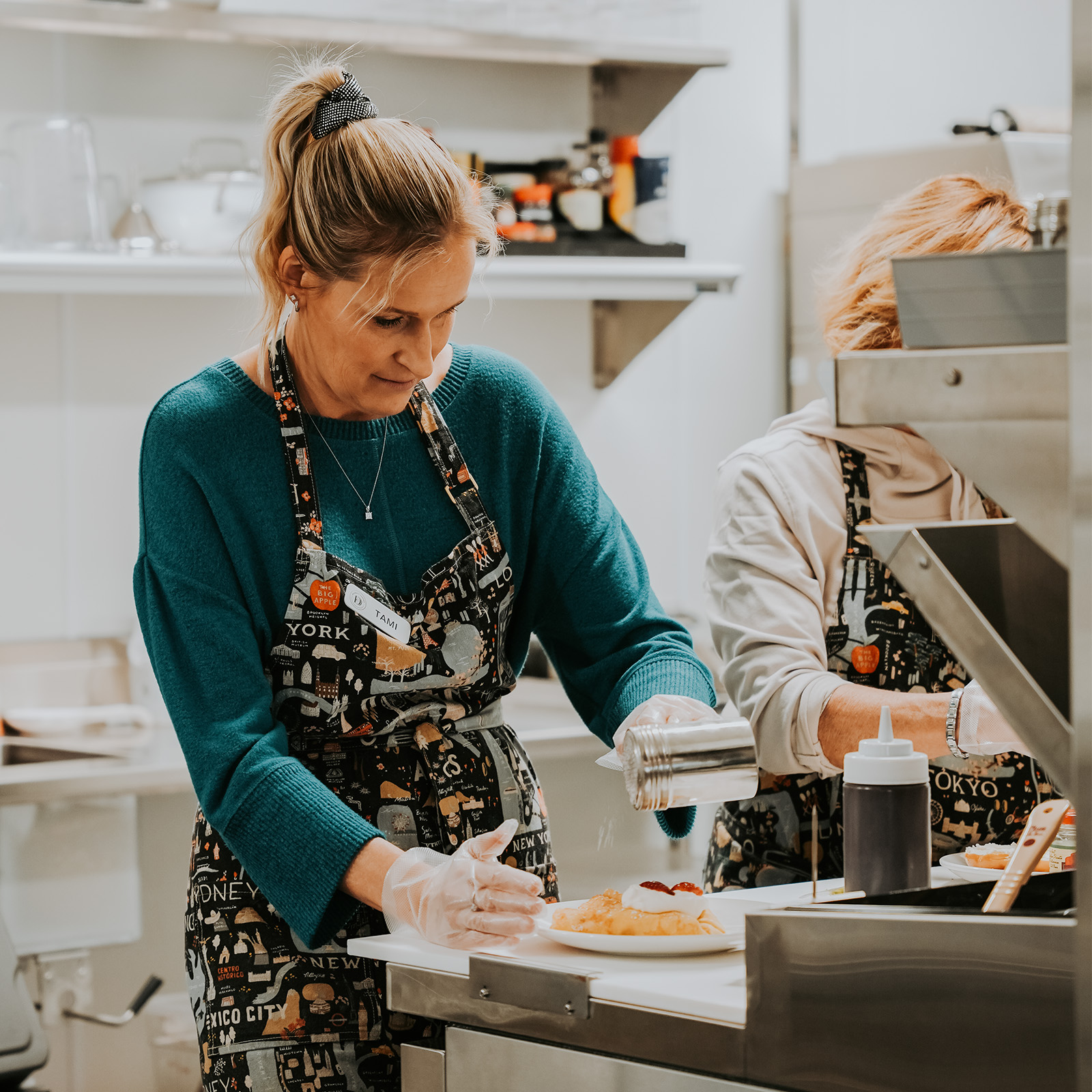 Female hand taking cup of hot coffee from barista